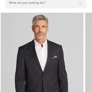 Gray Wool plaid  Silk Blend  Suit jacket and 100% black wool pants.  NEver worn